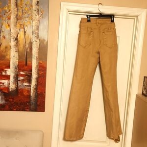 A pair of gold shimmering Fall/Winter pants size 10 by STUDIO for $15.00